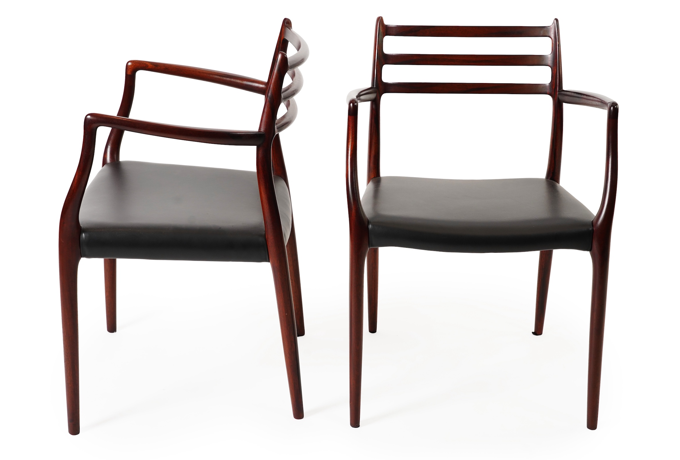 Niels Otto Møller (Danish, 1920-1982) for JL Møllers Møbelfabrik: A pair of 'Model 62' carver chairs